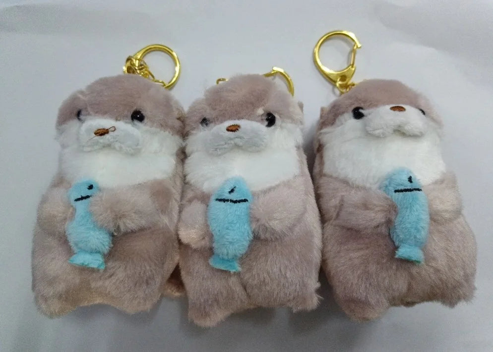 Cute Otters Holding Fish Plushie Keyrings